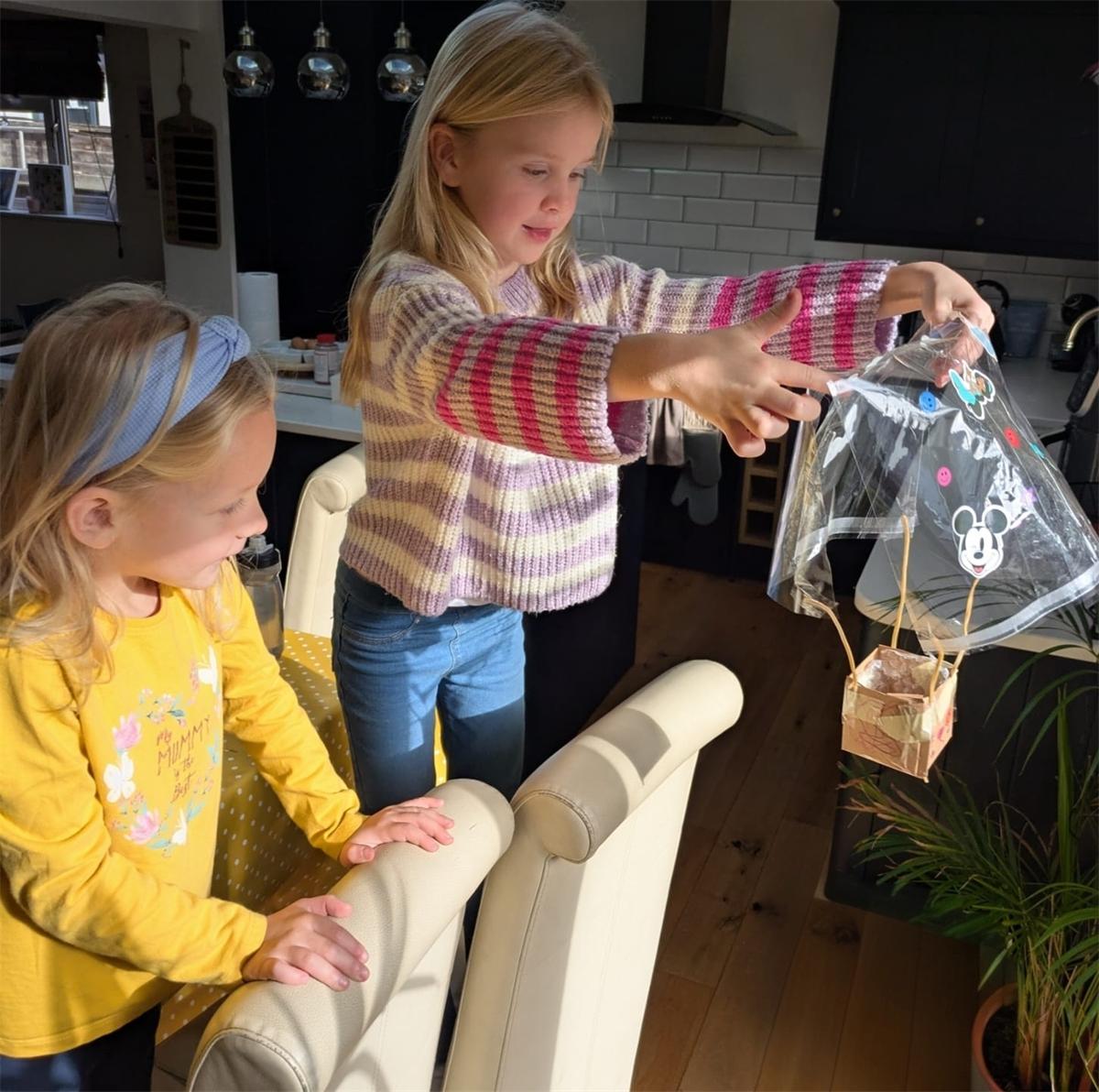 Children celebrating together at a Curiosity Classroom group session